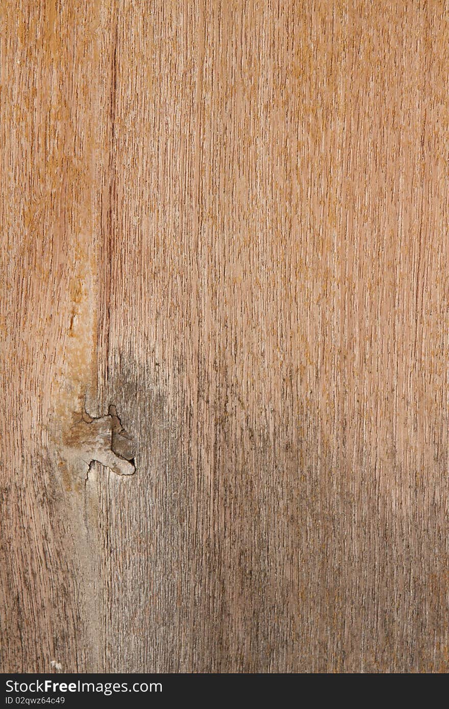 Wood grain background texture spotlit. Wood grain background texture spotlit