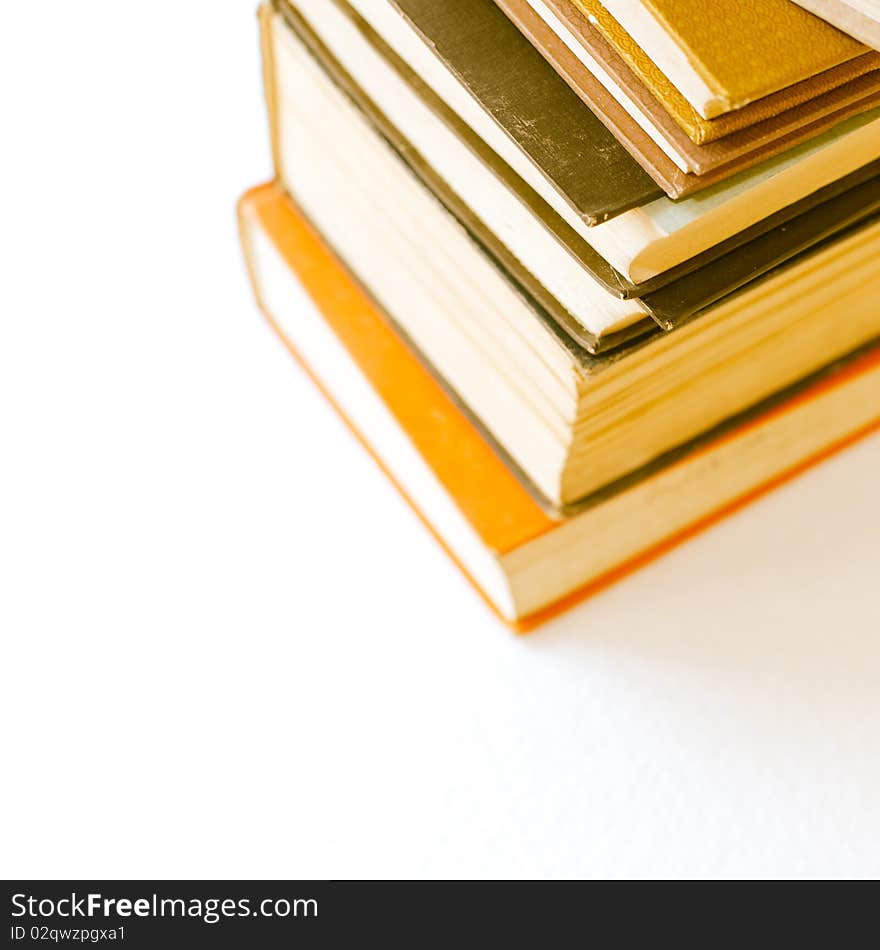 A large stack of old book in home .