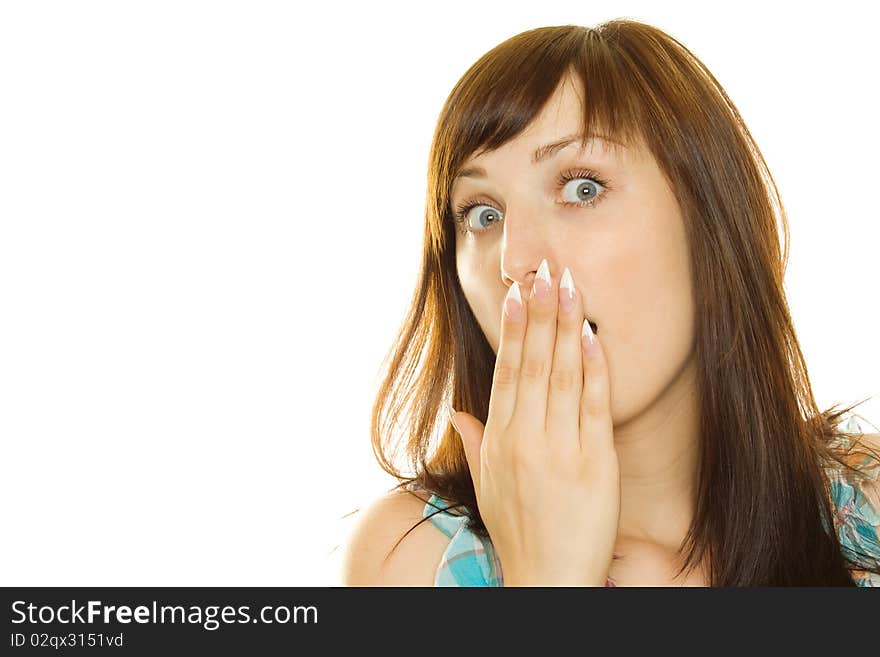 Young woman laughs and covers her mouth with his hand. Young woman laughs and covers her mouth with his hand