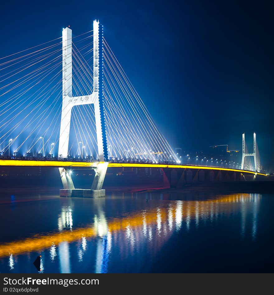 The night view of the bridge nanchang jiangxi china. The night view of the bridge nanchang jiangxi china.