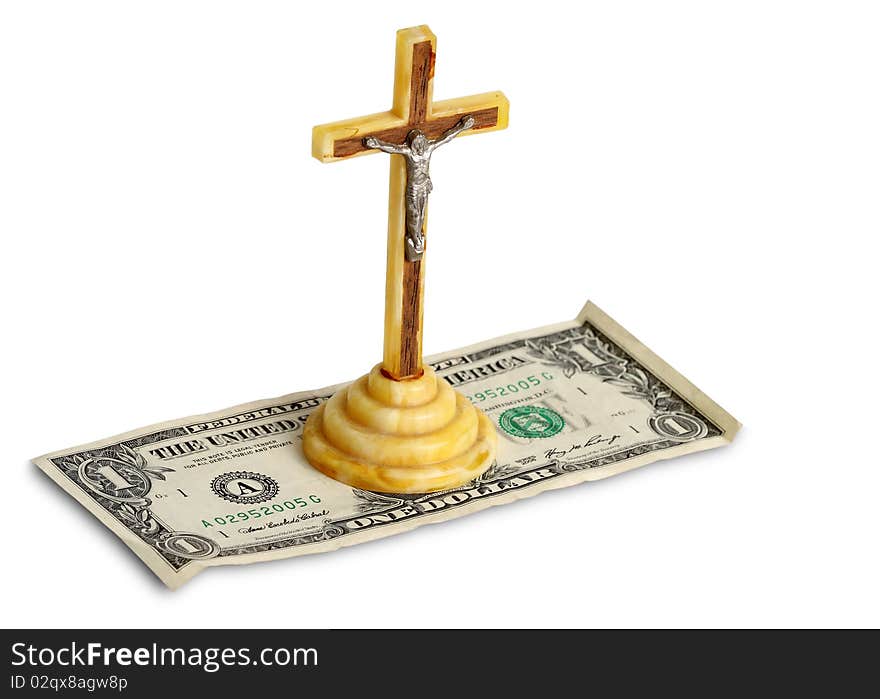 An amber cross over one dollar bill. An amber cross over one dollar bill