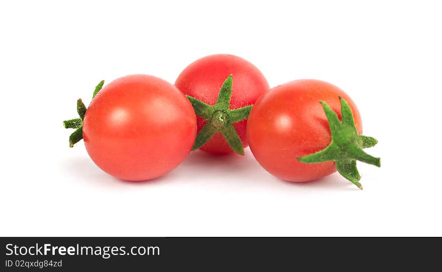 Small Tomatoes On A White Background