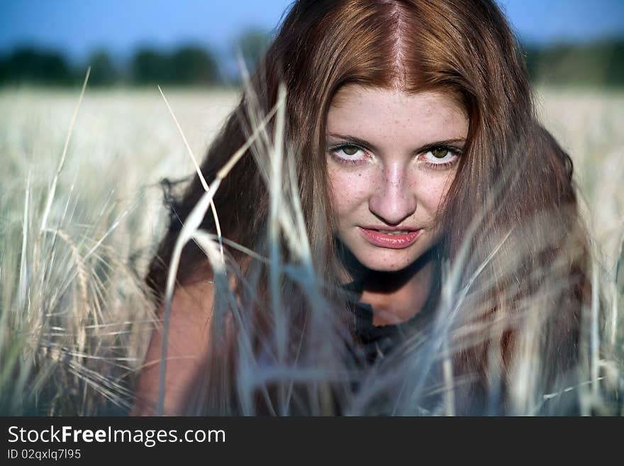 Portrait of an attractive red-haired girl