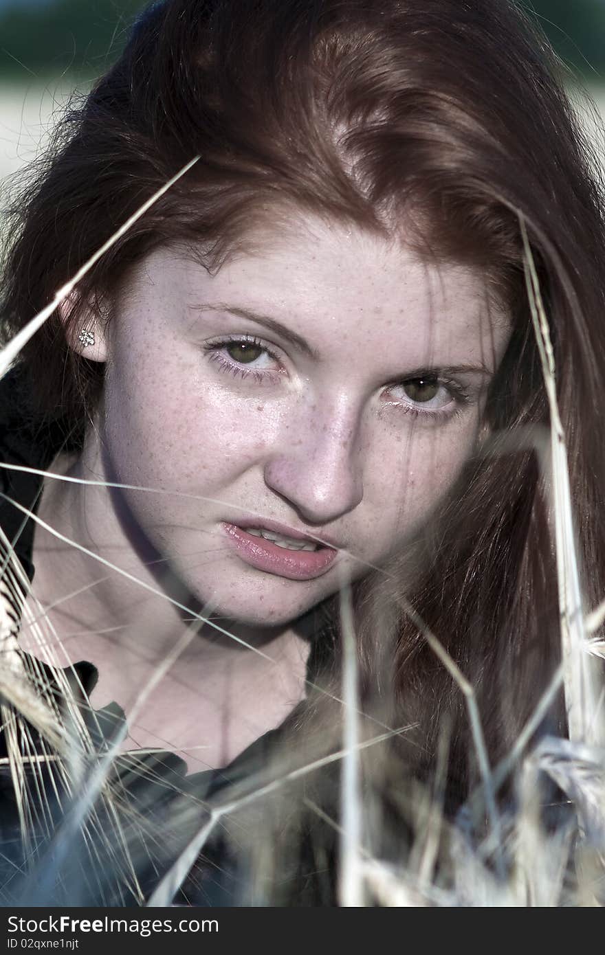 Portrait of an attractive red-haired girl