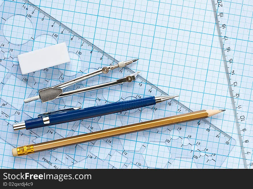 Drawing tools with a graph paper background. Drawing tools with a graph paper background