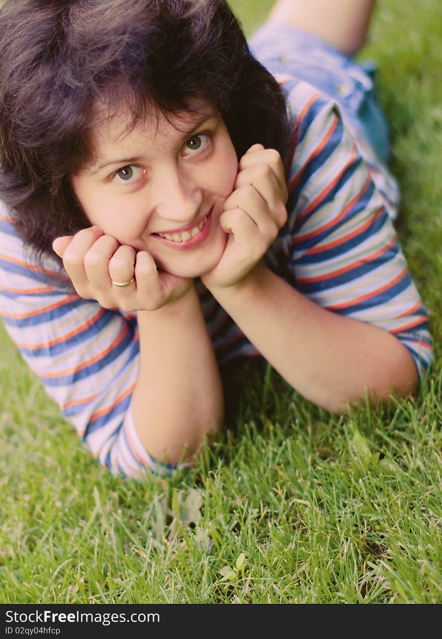 A young woman on the meadow