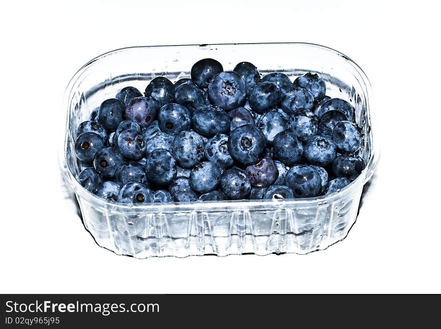 Transparent box of blueberries isolated on white background. Transparent box of blueberries isolated on white background