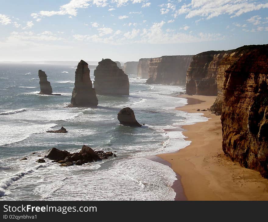 The Twelve Apostles are a set of rock formations off of the Great Ocean Road near Melbourne, Australia.