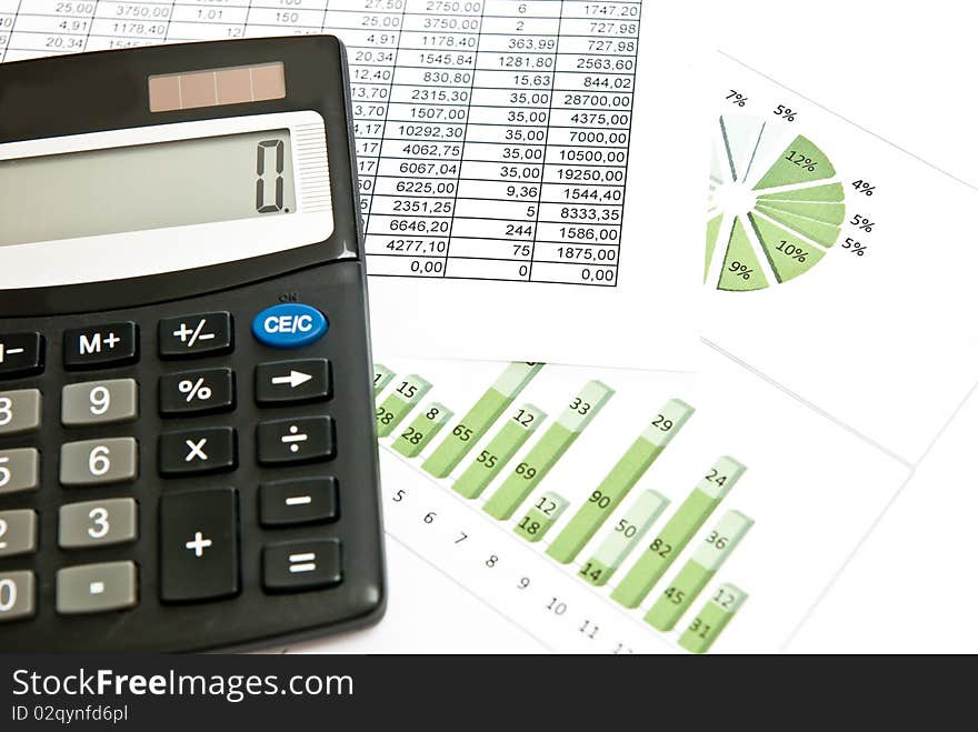 Close-up on stock market data chart and calculator. Close-up on stock market data chart and calculator.