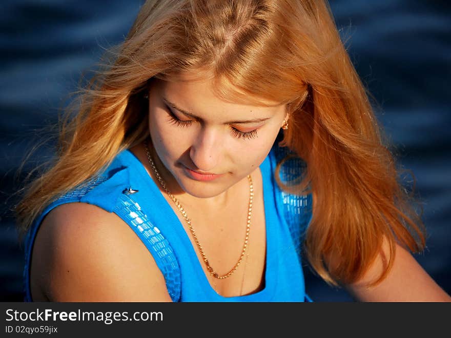 Young Girl On The Beach