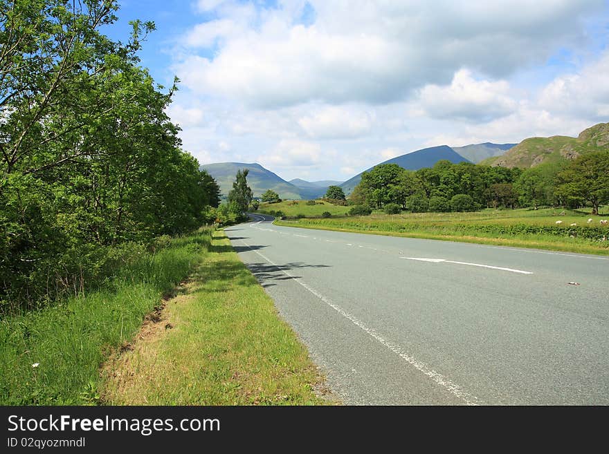 Travelling, a road  in Lake District. Travelling, a road  in Lake District