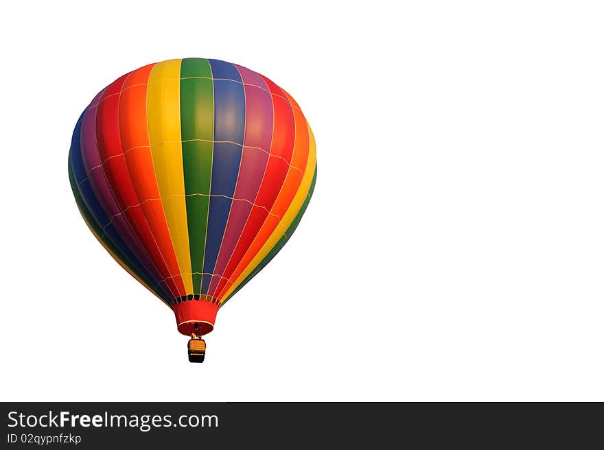 A rainbow colored hot air balloon isolated on white. A rainbow colored hot air balloon isolated on white