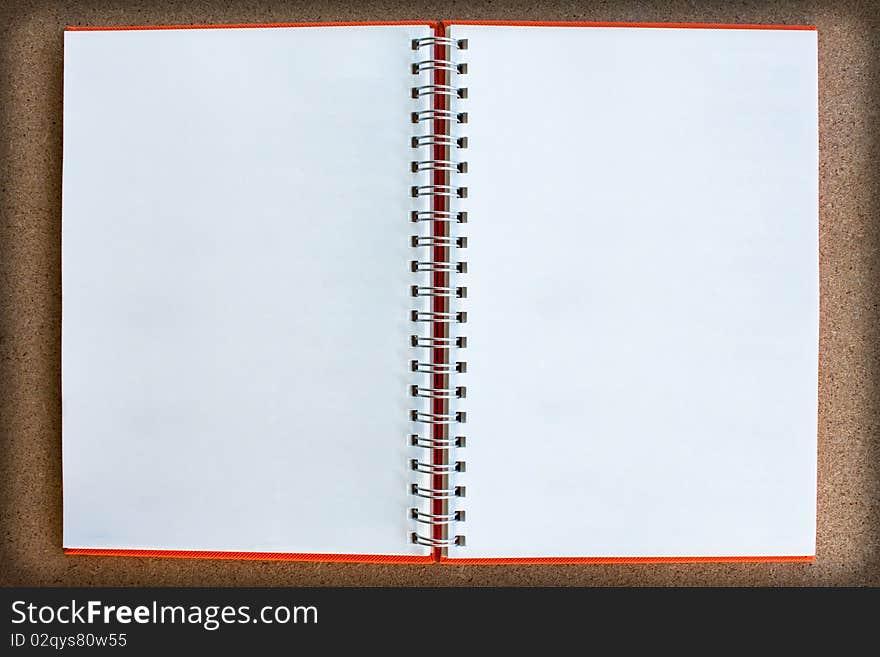 Blank twin face notebook on wood board