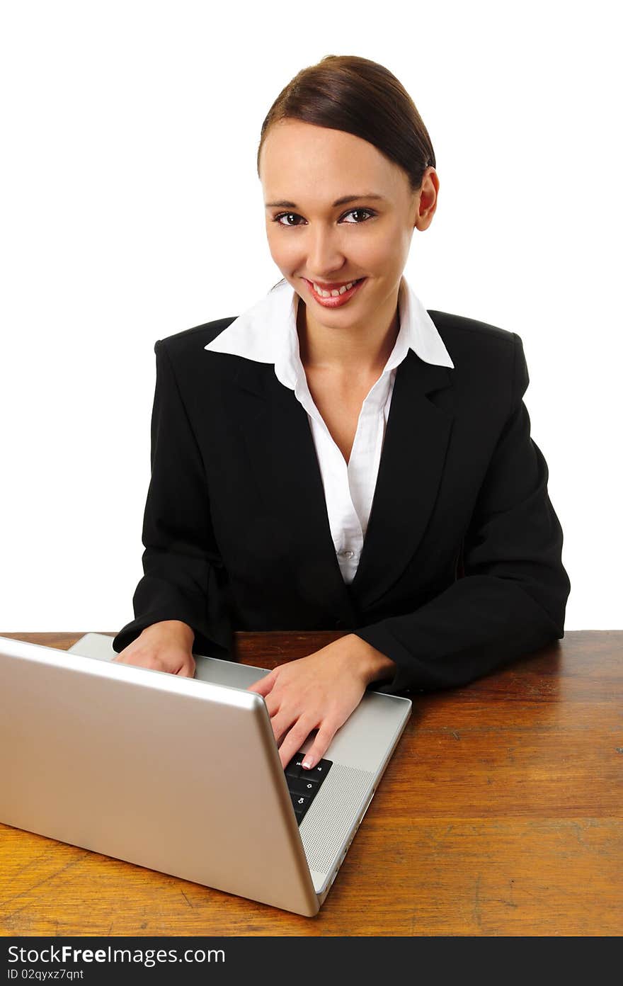 Young successful career woman works from her laptop. Young successful career woman works from her laptop