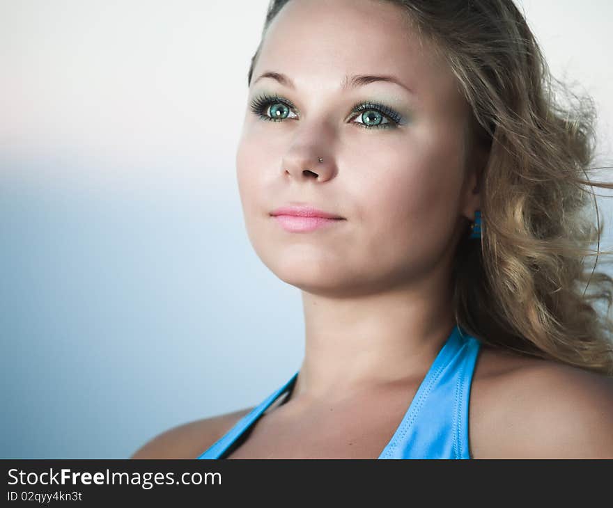 Outdoor portrait of a beautiful romantic woman. Outdoor portrait of a beautiful romantic woman