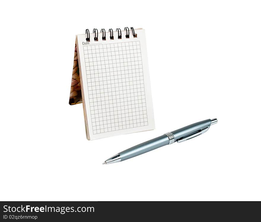 Notebook with pen on a white background