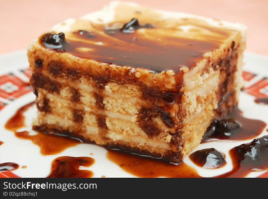 Cake with chocolate syrup