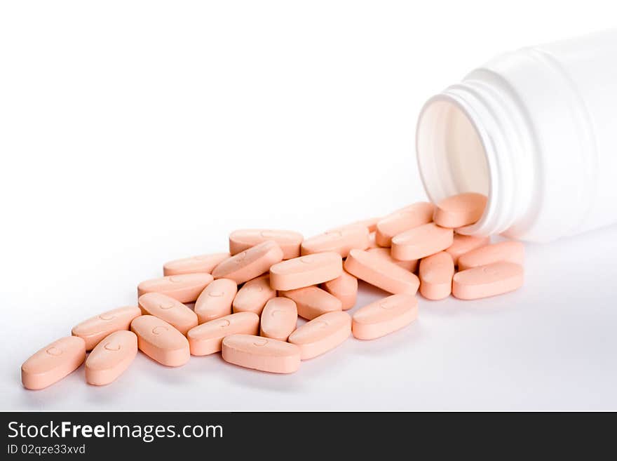 Closeup Of A Pack Of Pink Pills, Isolated