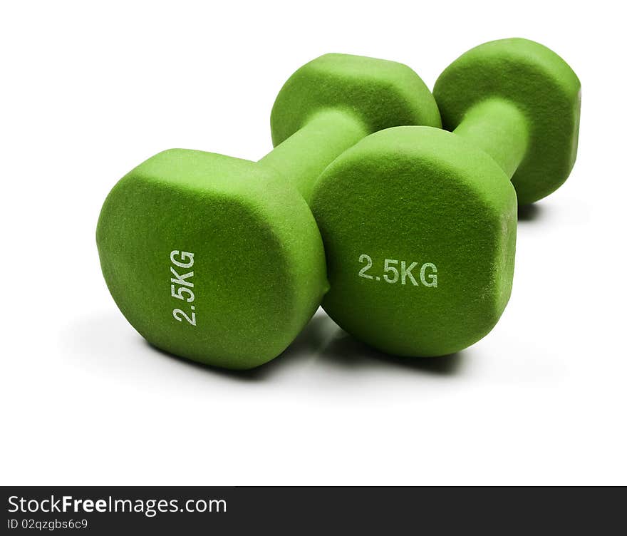 Green dumbbells on a white background with space for text