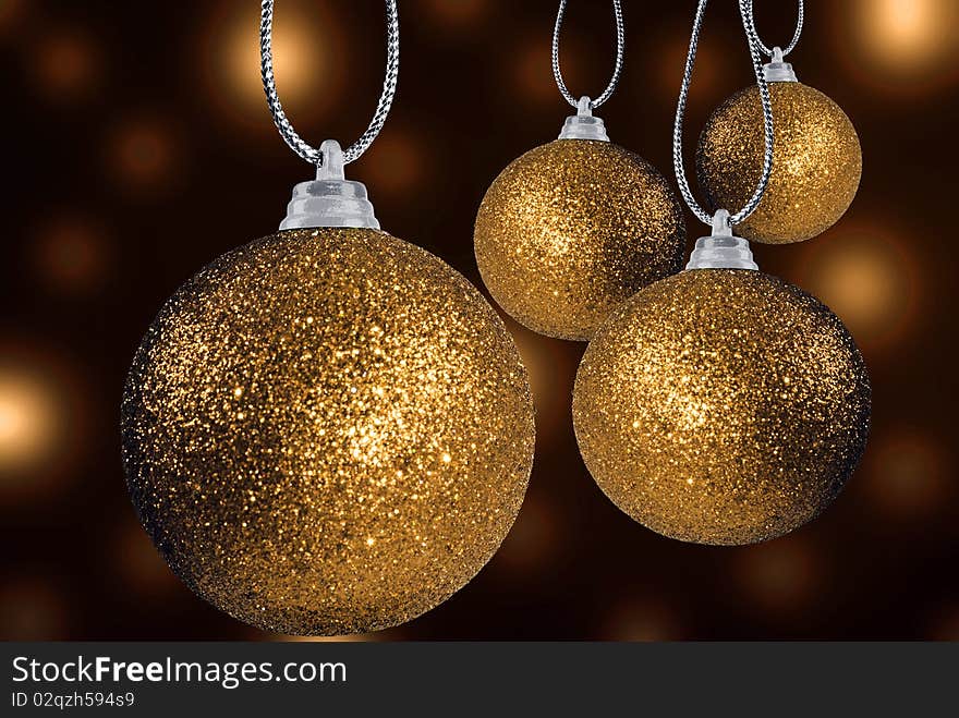 Golden Christmas Baubles On Strings