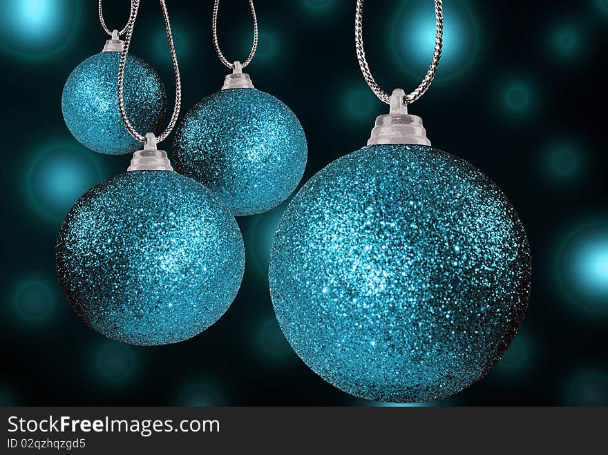 Blue christmas baubles on strings