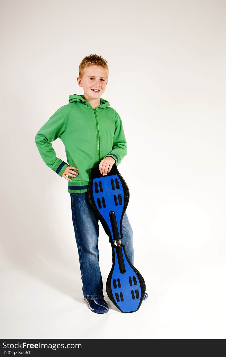 Teenager standing with waveboard