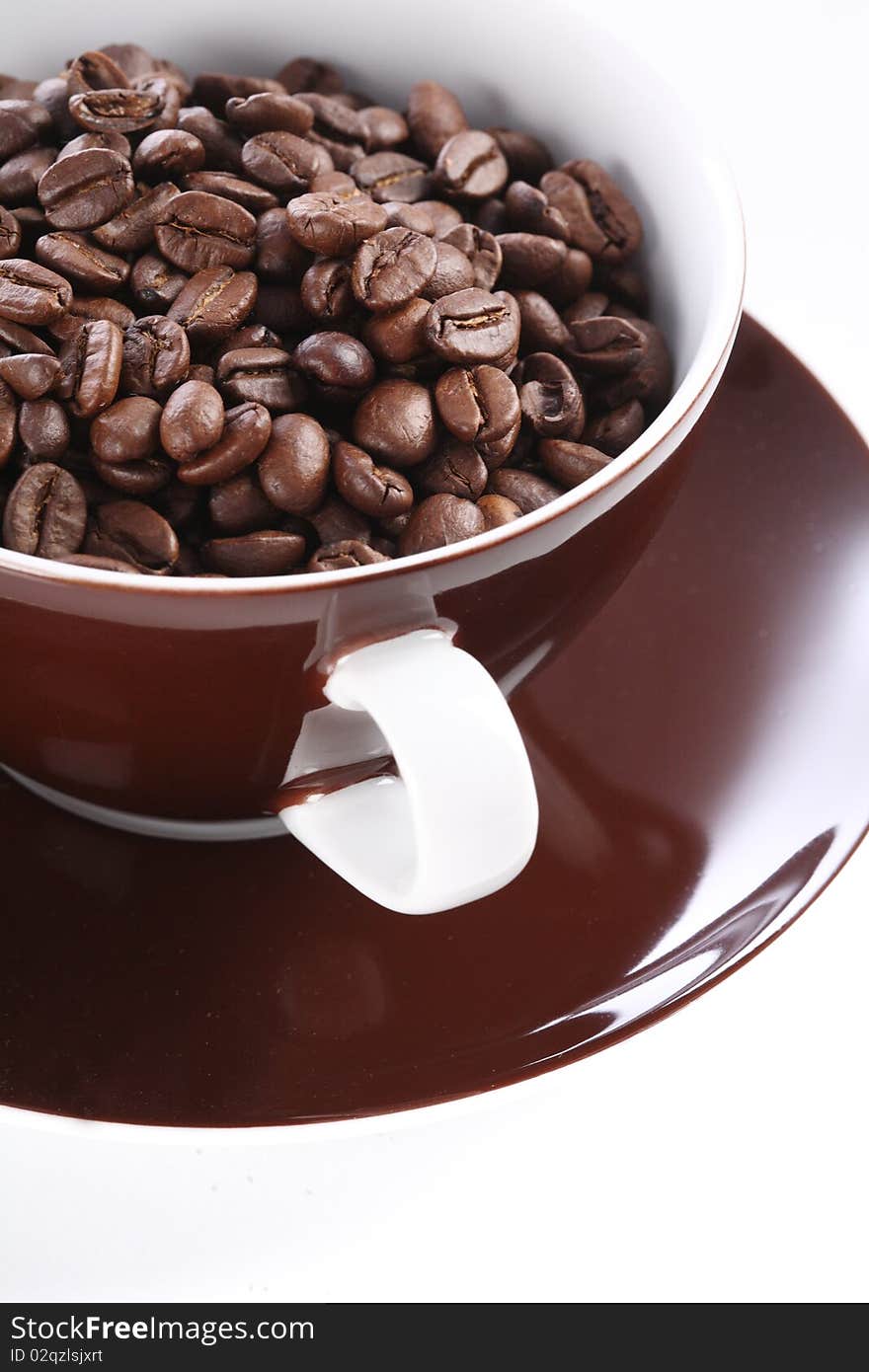 Coffee beans in a cup