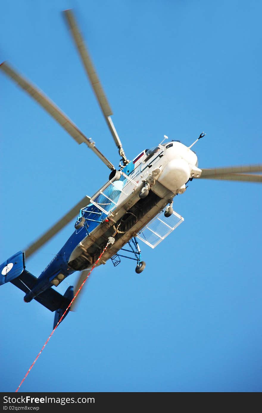 Fire rescue helicopter with water bucket