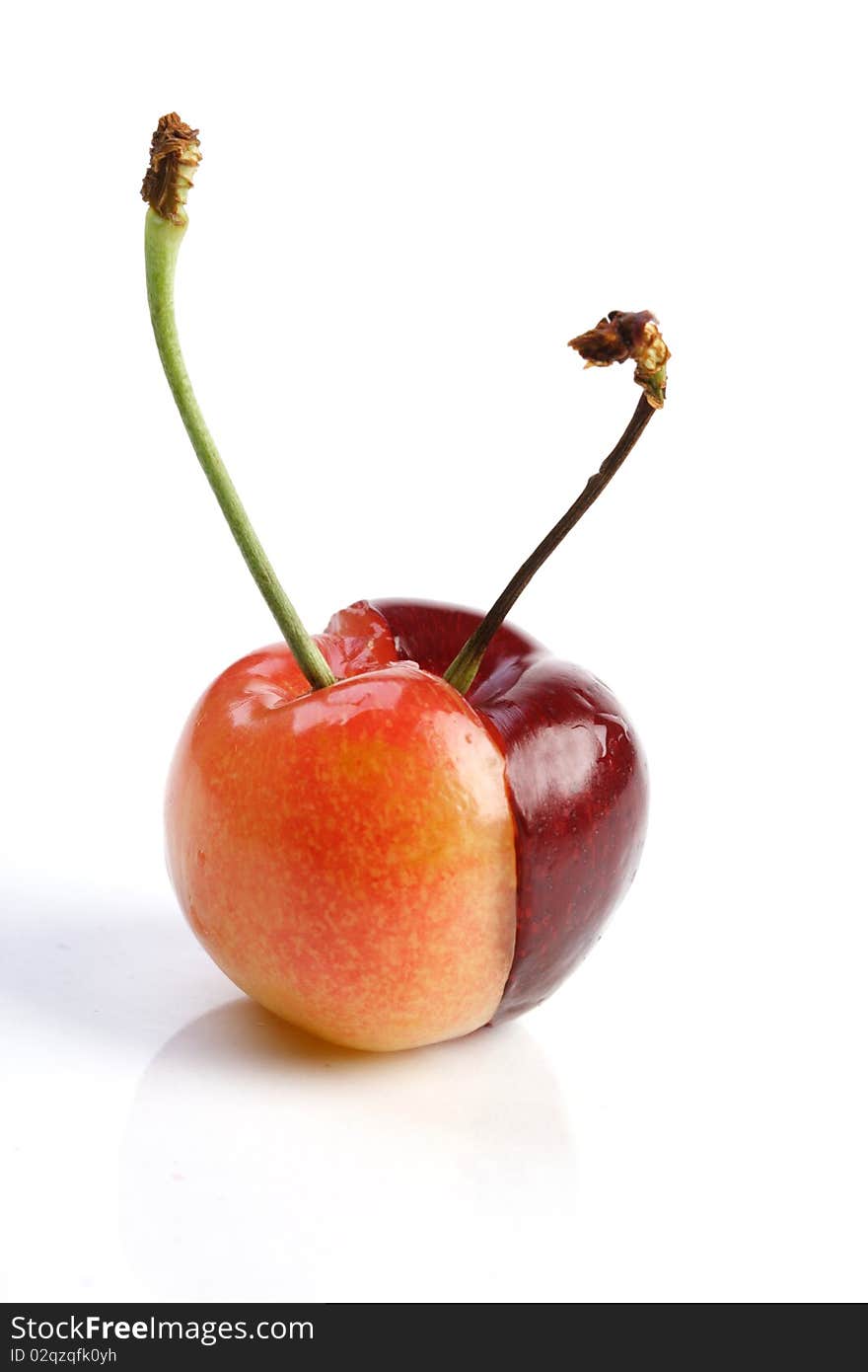 Few cherries on white background