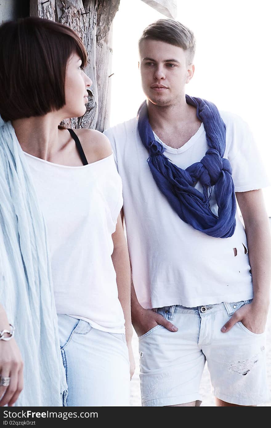 Lovely couple standing on the beach