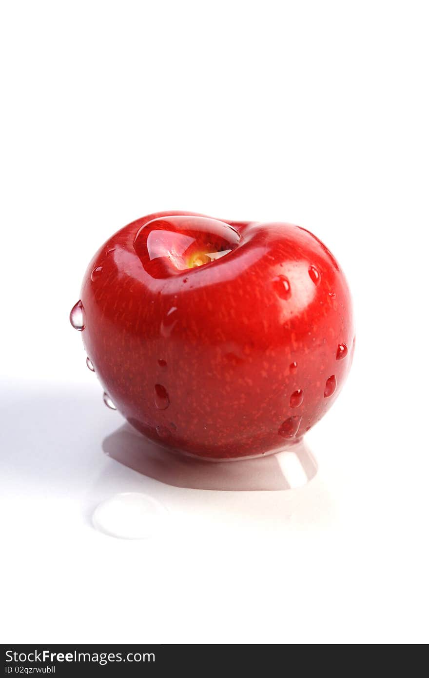 One cherry on white background