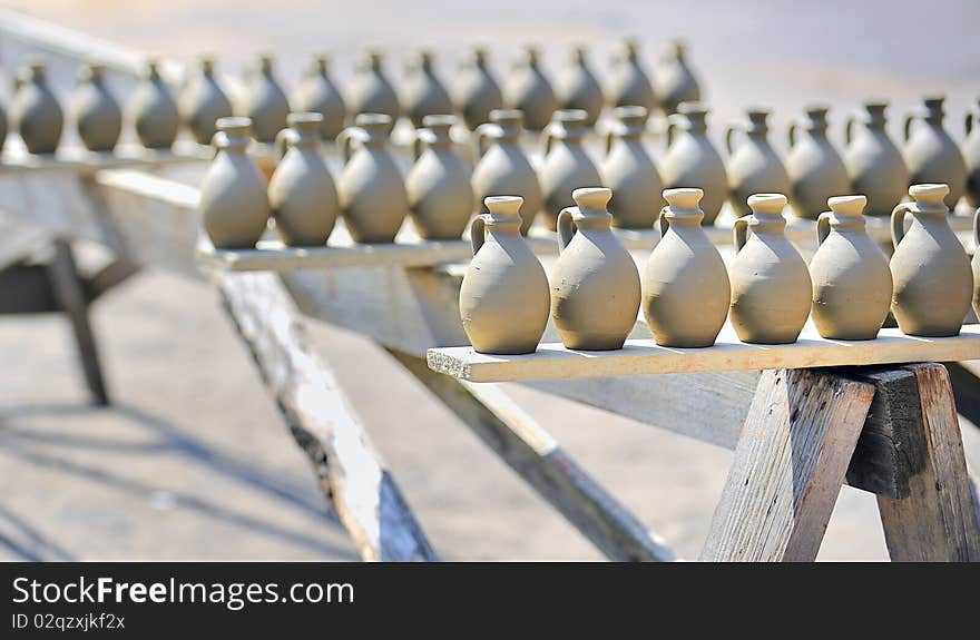 Drying ceramic vase outside in summer time