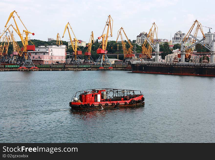 Image of moving boat in water area of port. Image of moving boat in water area of port