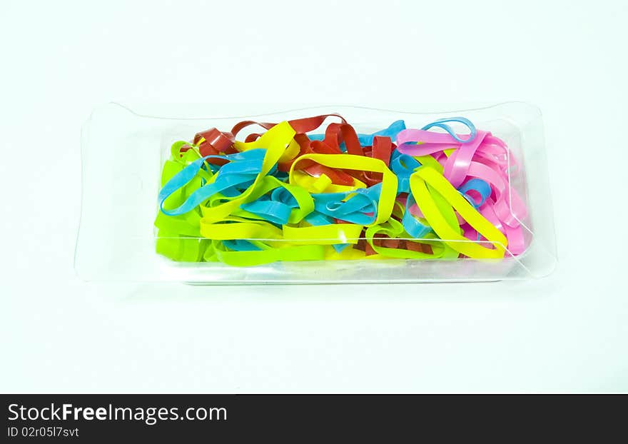 Meny rubber bands on white background