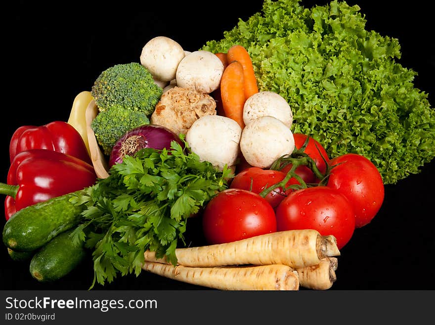 Various vegetables on the black background