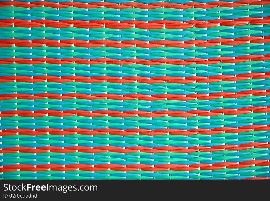 Red green color plastic mat blackground