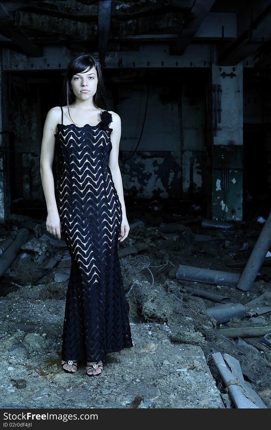 one caucasian model posing in devastated building. one caucasian model posing in devastated building