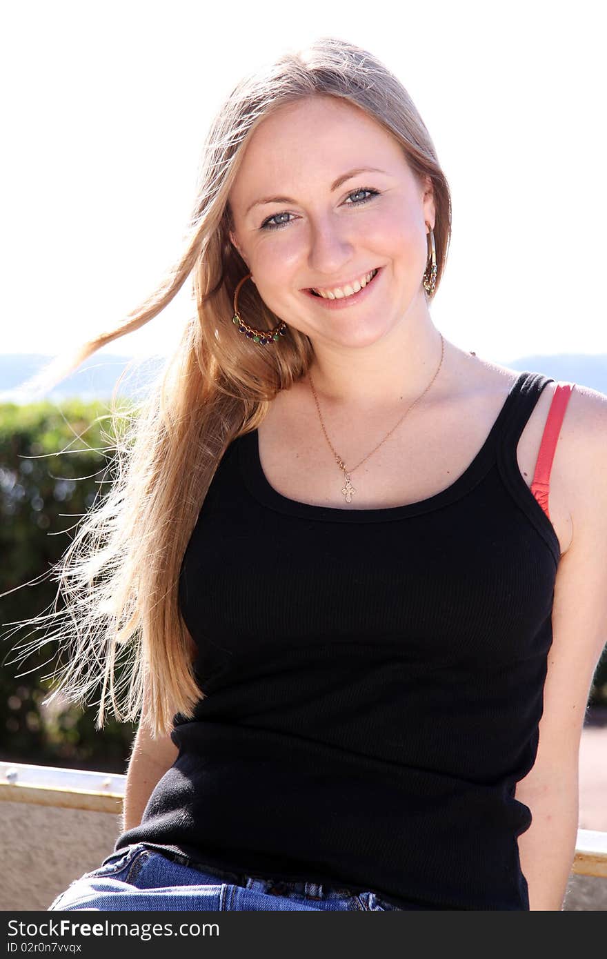 Beautiful young girl smiling. Outdoor portrait