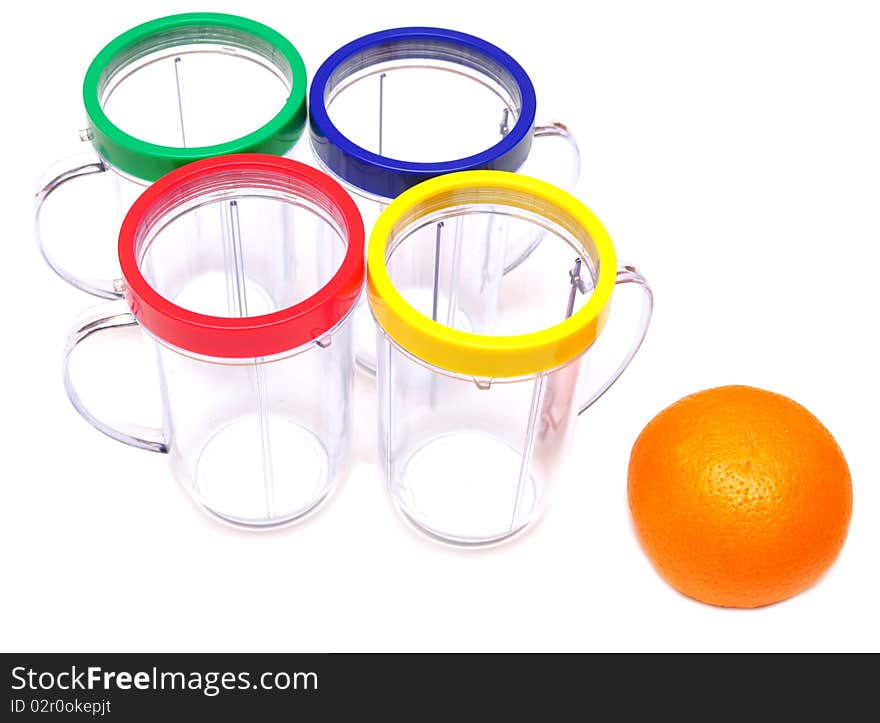 Fresh oranges and empty juice glass