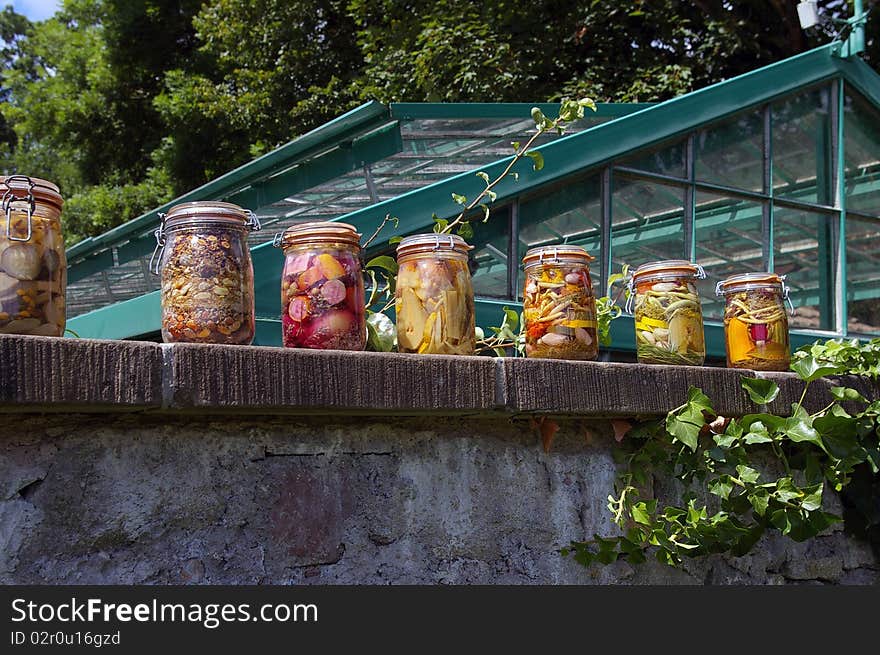 Colorful Jars In Kitchengarden.