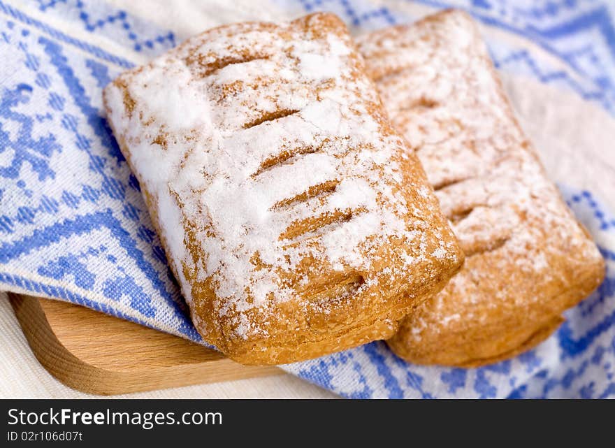 Two puff pastry with sugar powder