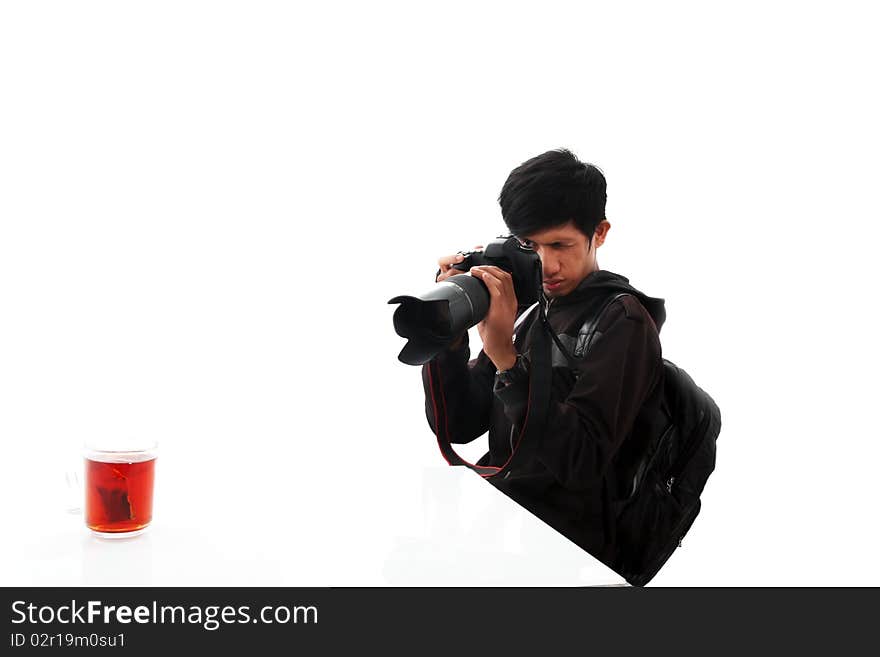 Portrait of a photographer while shooting an object tea
. Portrait of a photographer while shooting an object tea