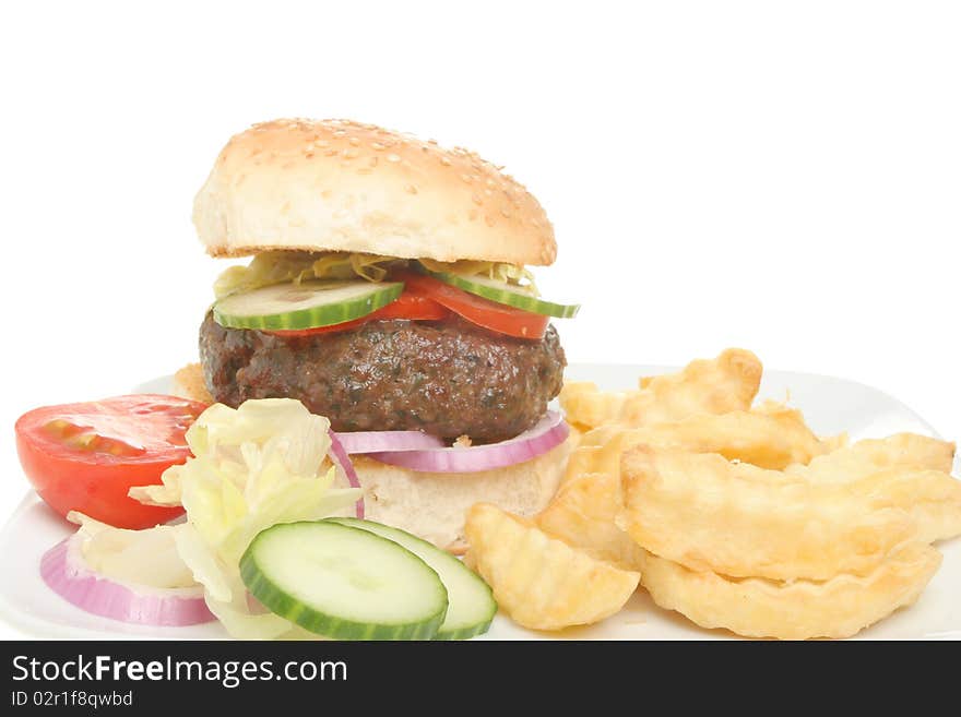 Closeup of a burger salad and chips. Closeup of a burger salad and chips