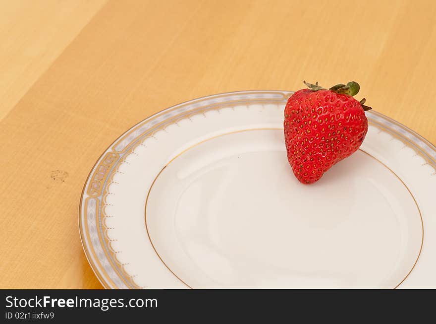 Strawberry on White Ceramic Plate ( Custom Space ). Strawberry on White Ceramic Plate ( Custom Space )