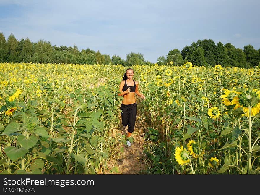 Young attractive girl running on the morning. Young attractive girl running on the morning