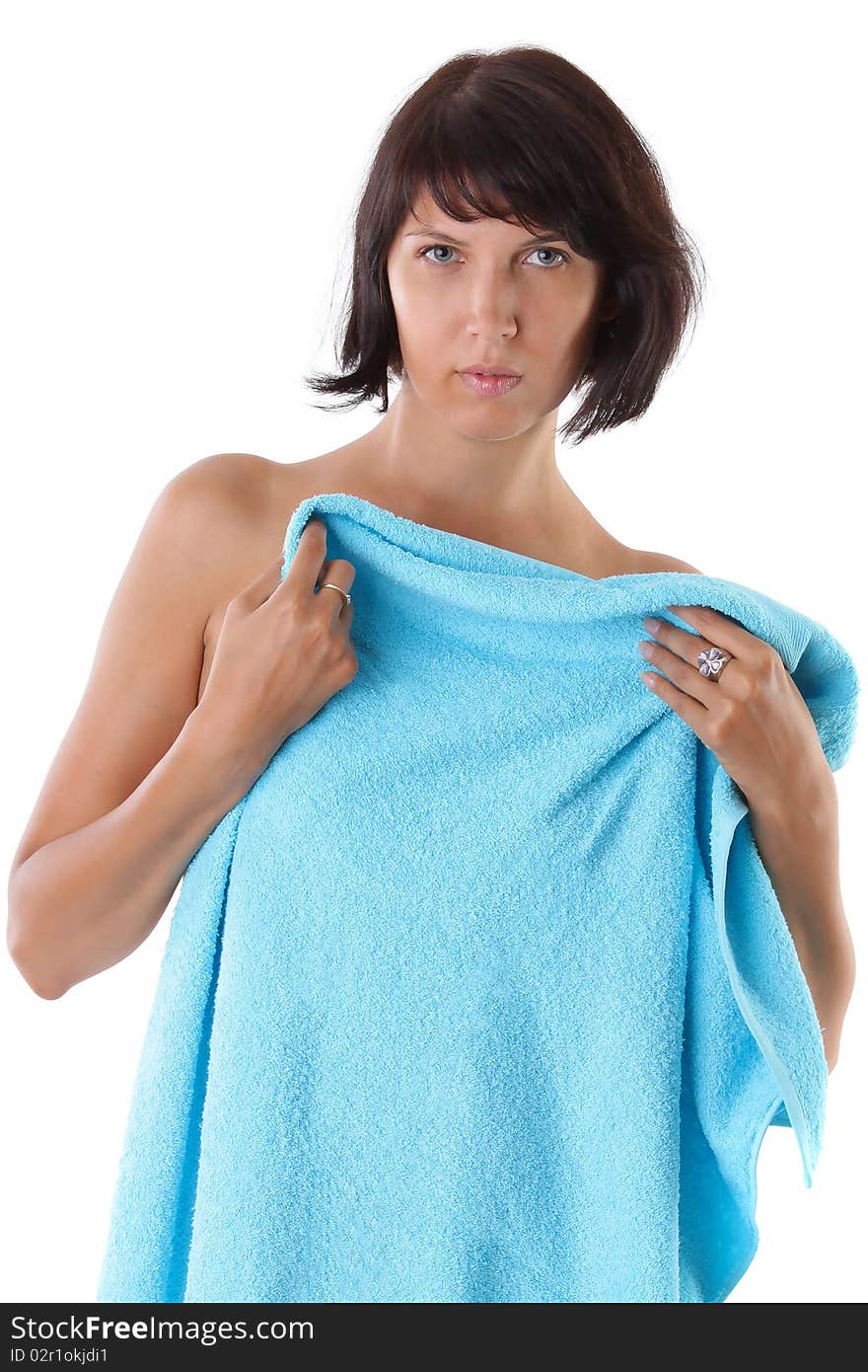 Portrait of sexy brunette woman with blue towel before spa treatment. Series. Portrait of sexy brunette woman with blue towel before spa treatment. Series