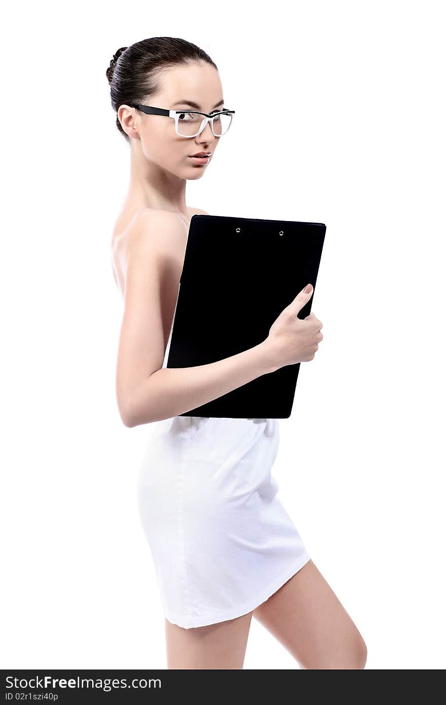 Beautiful young woman posing with worksheet. Isolated over white background. Beautiful young woman posing with worksheet. Isolated over white background.