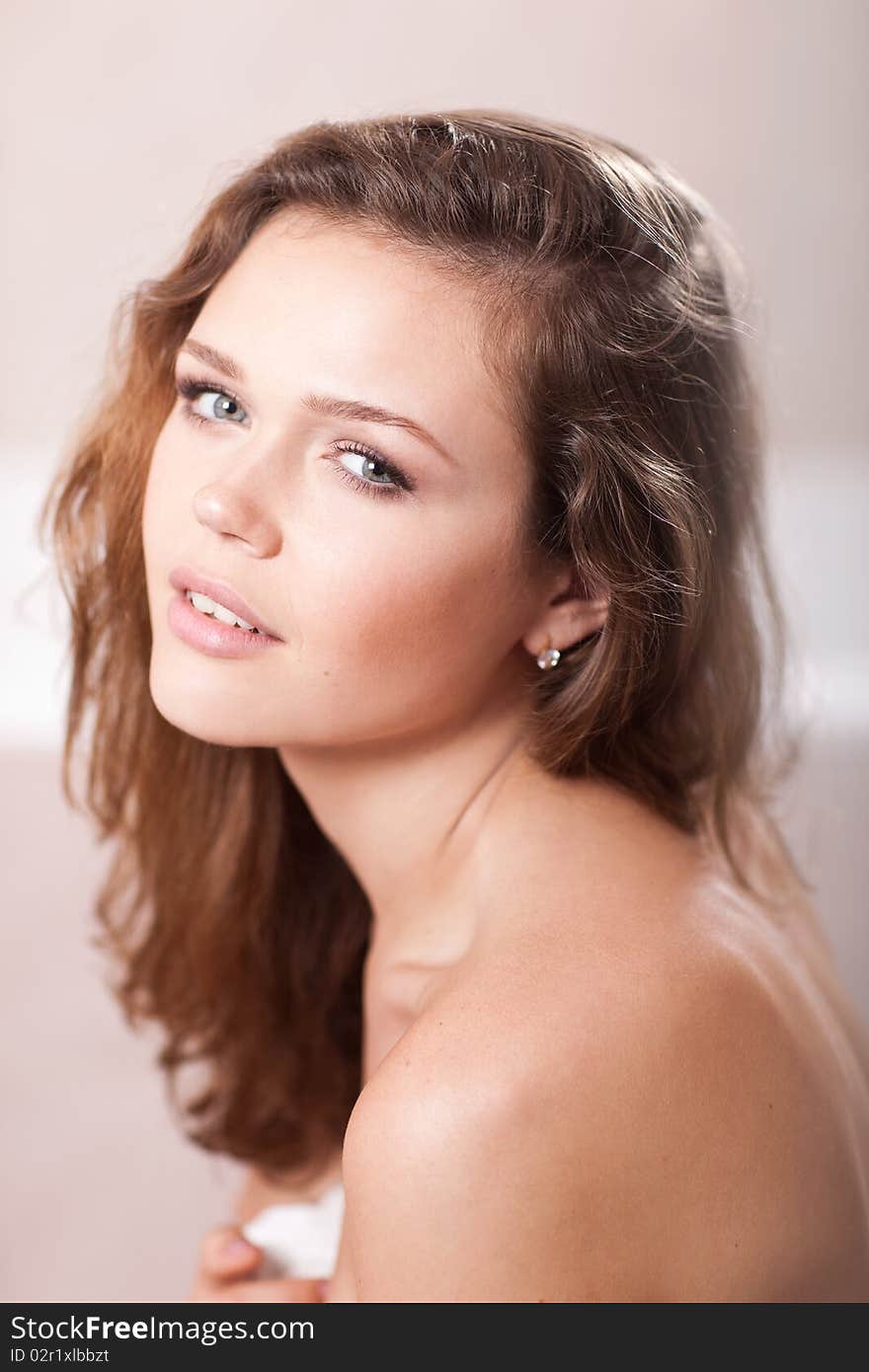 Closeup portrait of attractive caucasian young adult in bathroom. Closeup portrait of attractive caucasian young adult in bathroom