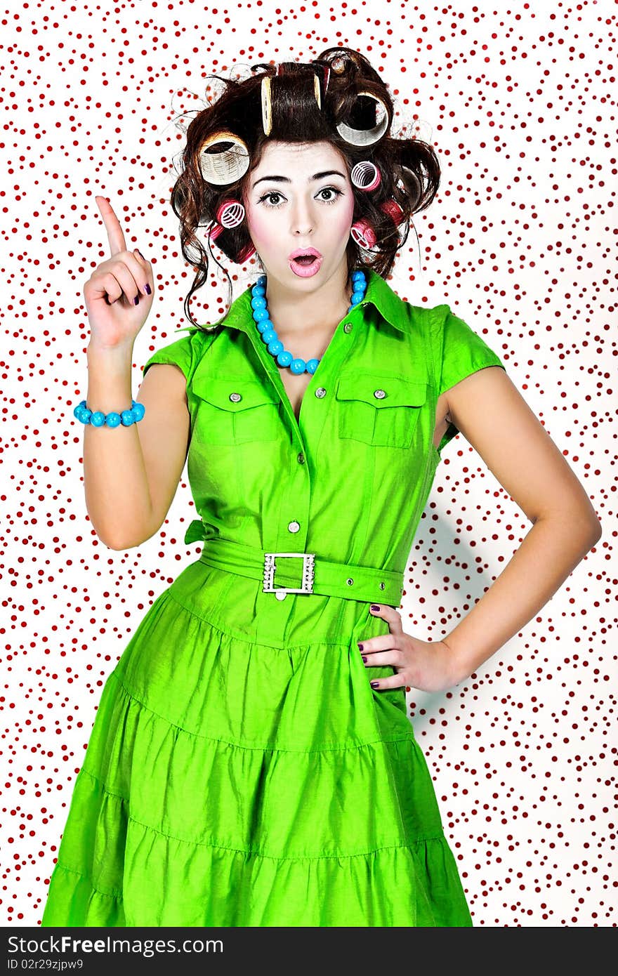 Shot of a funny woman housewife dressed in retro style. Shot of a funny woman housewife dressed in retro style.