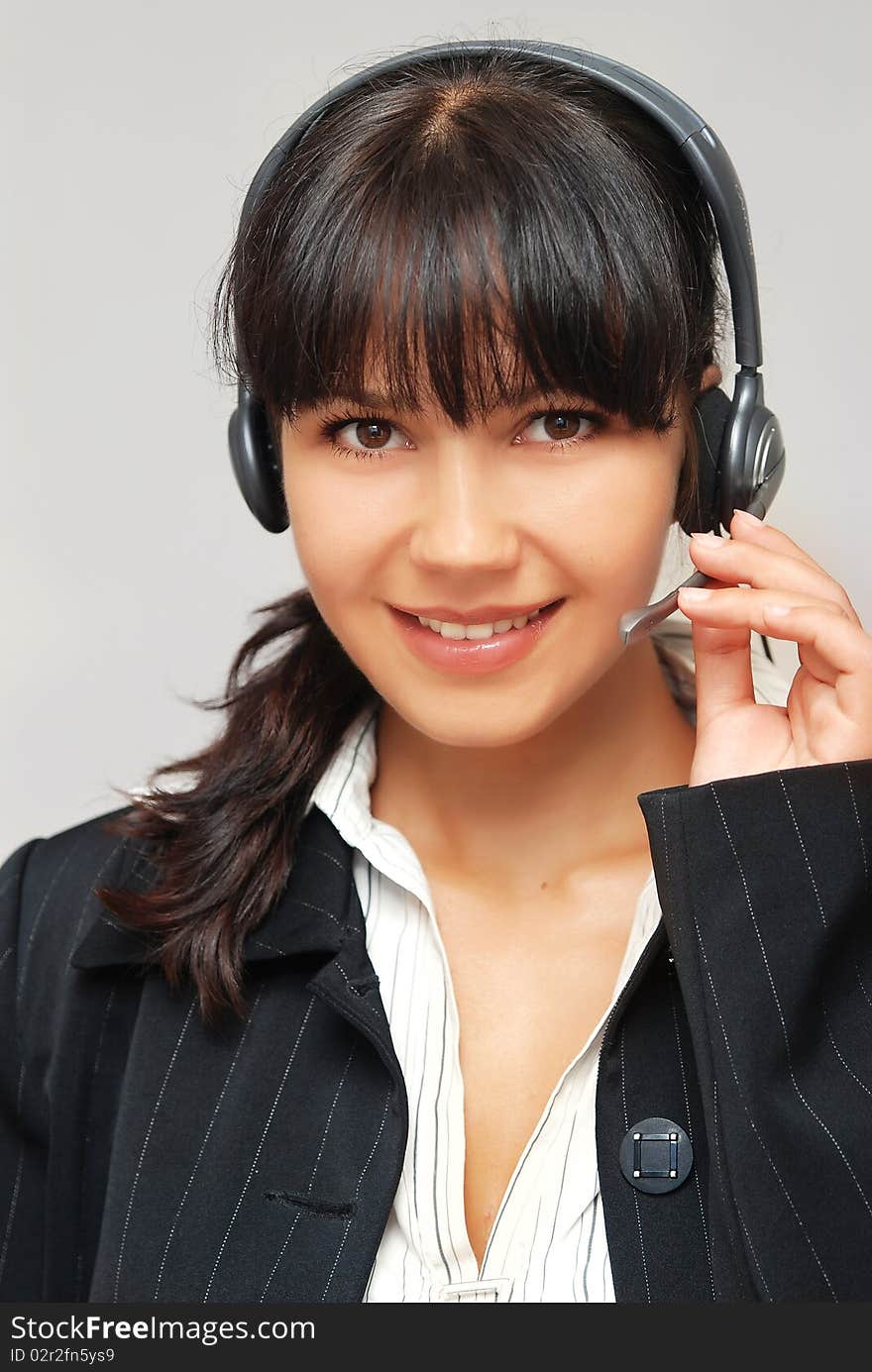 Young beautiful woman with headset